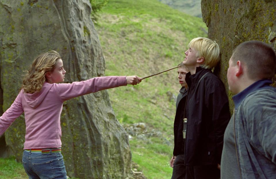 Emma Watson threatens Tom Felton in Harry Potter and the Prisoner of Azkaban (Credit: Warner Brothers)