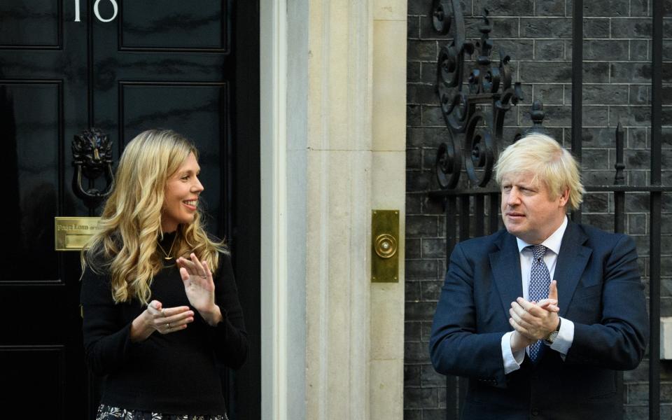 Mr Johnson with his finacee, who is said to have masterminded a refurbishment of the No11 Downing Street flat -  Getty Images Europe/Leon Neal