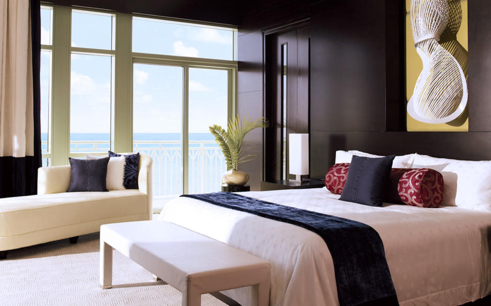 <p><strong>Starting Rate: $20,649</strong></p> <p>The two-master bedroom <a rel="nofollow noopener" href="http://www.atlantisbahamas.com/rooms/thecoveatlantis/penthousesuites" target="_blank" data-ylk="slk:Penthouse Suite;elm:context_link;itc:0;sec:content-canvas" class="link ">Penthouse Suite</a> at <a rel="nofollow noopener" href="http://www.travelandleisure.com/travel-guide/bahamas/hotels/the-cove-atlantis" target="_blank" data-ylk="slk:The Cove Atlantis in Paradise Island;elm:context_link;itc:0;sec:content-canvas" class="link ">The Cove Atlantis in Paradise Island</a> is a 4,070-square foot Bahamian oasis. Enjoy the ocean view from floor-to ceiling-windows or your wraparound balcony. When you tire of staring at the crashing waves, there’s a media room with a complete theater system and a 10-seat dining room with a private, on-demand chef. Alternatively, head to The Cove Club (a special retreat for guests staying in the suites) for a breakfast feast before spending the day at the resort’s 141-acre water park, Aquaventure. Here, you'll find 18 water sides, 11 pools, 14 lagoons featuring 20,000 aquatic animals, three white-sand beaches, and two river rides. </p>