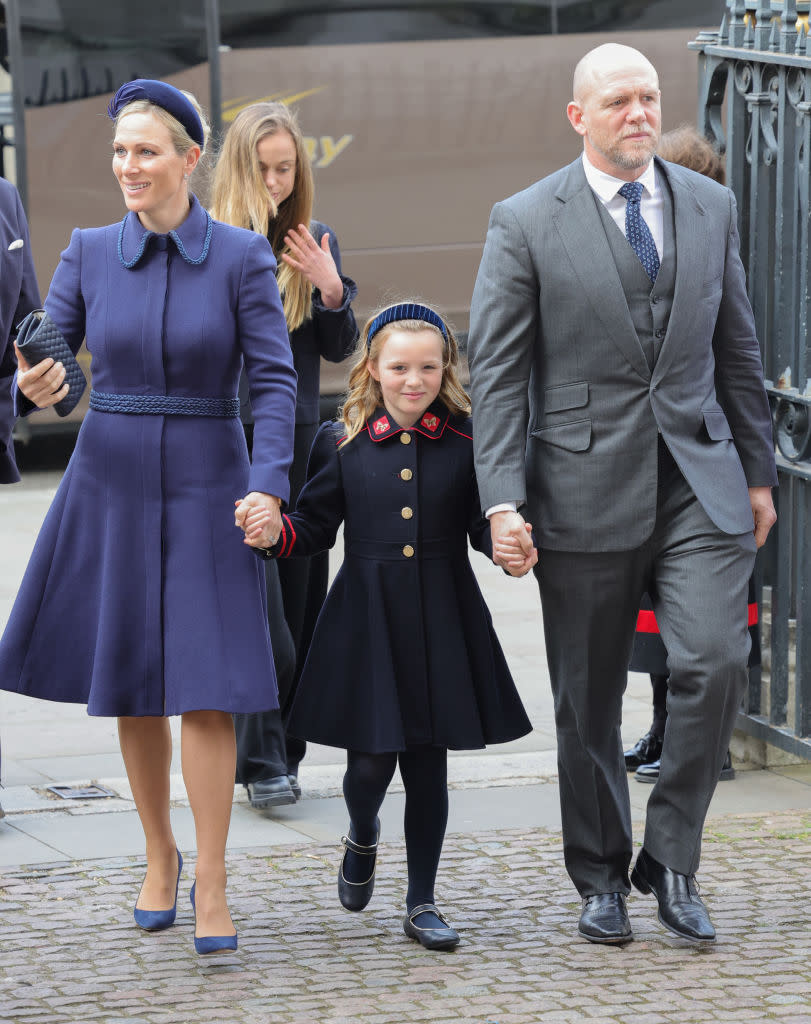 Zara Tindall, Mia Grace Tindall and Mike Tindall attend the memorial service for the Duke Of Edinburgh at Westminster Abbey on March 29, 2022 in London, England
