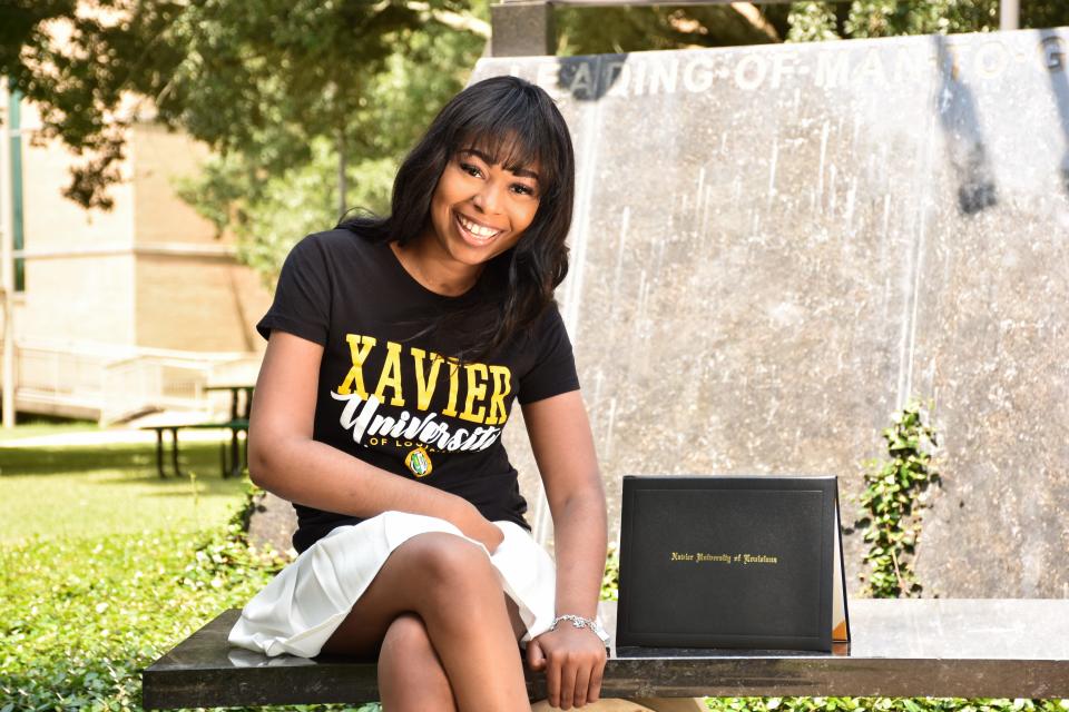 Aiyana Jones poses for a photo at Xavier University of Louisiana, in New Orleans, on her graduation day, on May 27, 2023.