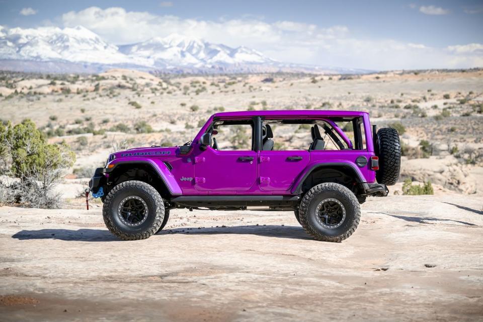 <p>This purplish-pink Wrangler looks especially tough thanks to its 37-inch tires. They're mounted on 17-inch wheels from American Expedition Vehicles (AEV), which also supplies its front and rear bumpers. If things get too sticky, there's also a Warn Zeon winch to tow it to safety.</p>