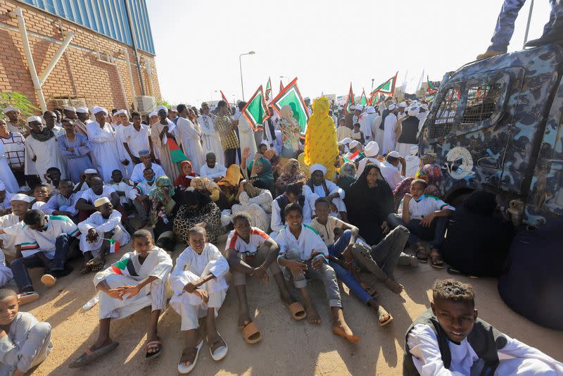 Supporters of Sudanese political and religious leader gather at the airport to welcome him in Khartoum