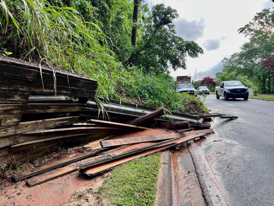 The eroded hillside pushed through a barrier heading into downtown along Mahan/Tennessee after the April 11 flash flood.