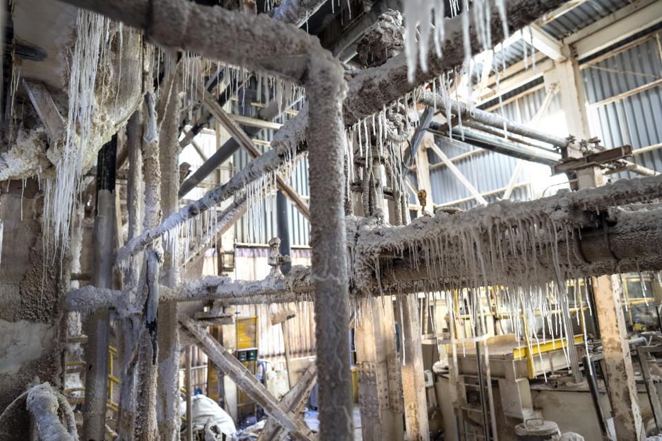 Salt coats machinery at the SQM lithium processing plant in Antofagasta, Chile, Wednesday, April 19, 2023. (AP Photo/Rodrigo Abd)