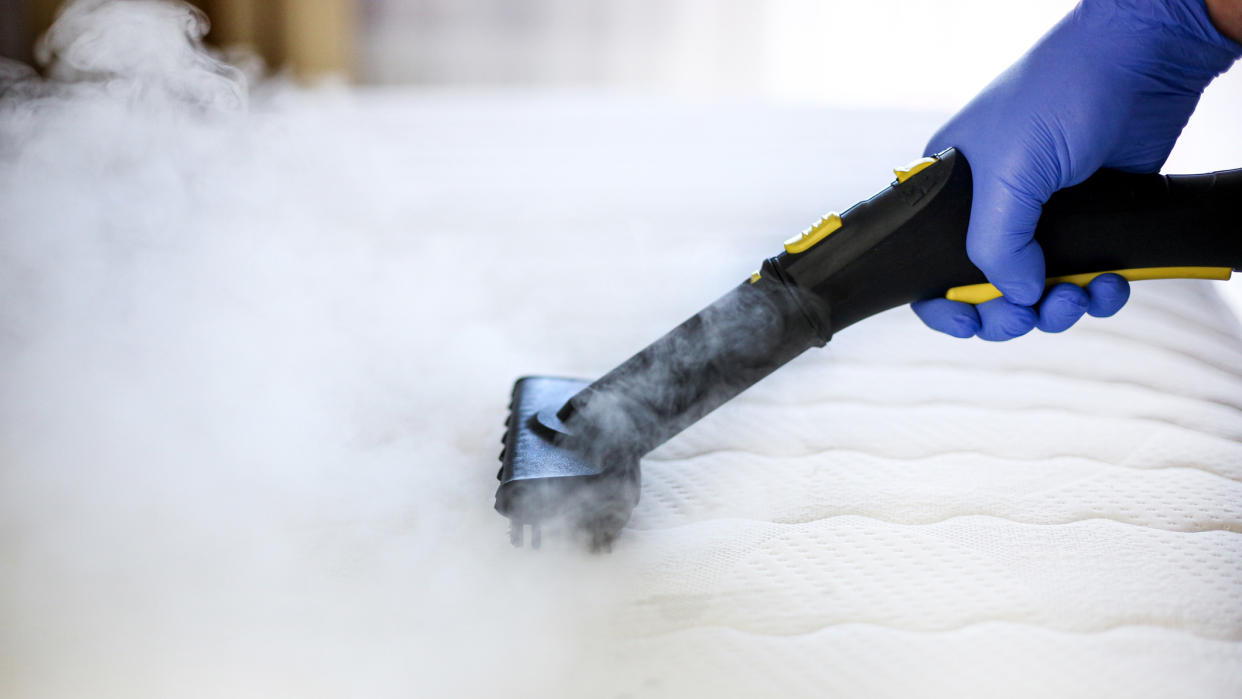  A mattress being stem cleaned to get rid of dust bites and bed bugs. 