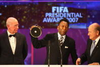 ZURICH, SWITZERLAND - DECEMBER 17: Pele (C) receives the Presidents Award from FIFA President Sepp Blatter (R) and Sir Bobby Charlton during the FIFA World Player of The Year Gala 2007 at the Zurich Opera House on December 17, 2007 in Zurich, Switzerland. (Photo by Michael Steele/Getty Images)