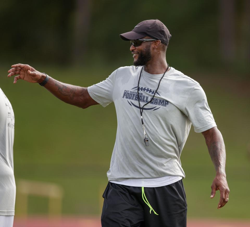 Former Florida State and Dallas Cowboys football player Pat Watkins hosts a youth football camp at Florida High on Friday, June 18, 2021.