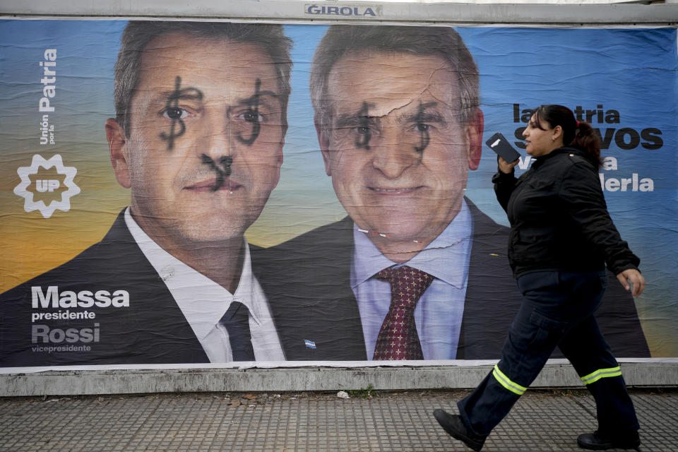 An election campaign banner for presidential hopeful Sergio Massa, the current economy minister, and his running mate Agustin Rossiduring covers a street wall in Buenos Aires, Argentina, Wednesday, Aug. 9, 2023. Primary elections are set for all parties for Aug. 13. (AP Photo/Natacha Pisarenko)