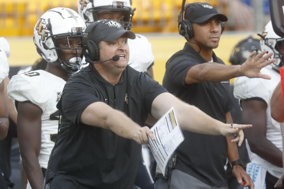 Central Florida head coach Josh Heupel yells instructions to his team during the second half of an NCAA college football game against Pittsburgh, Saturday, Sept. 21, 2019, in Pittsburgh. (AP Photo/Keith Srakocic)
