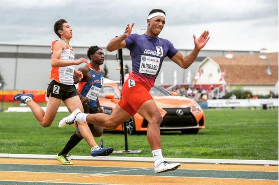 Chuba Hubbard celebrating winning a track race.