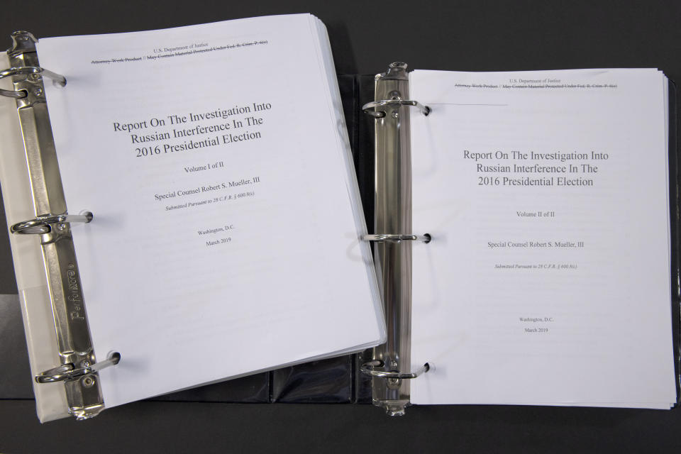 Special counsel Robert Mueller's redacted report on the investigation into Russian interference in the 2016 presidential election is photographed Thursday, April 18, 2019, in Washington. The report contained two volumes. (AP Photo/Jon Elswick)