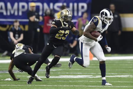 Jan 20, 2019; New Orleans, LA, USA; Los Angeles Rams tight end Gerald Everett (81) is chased by New Orleans Saints cornerback Marshon Lattimore (23) during the fourth quarter in the NFC Championship game at Mercedes-Benz Superdome. Mandatory Credit: John David Mercer-USA TODAY Sports