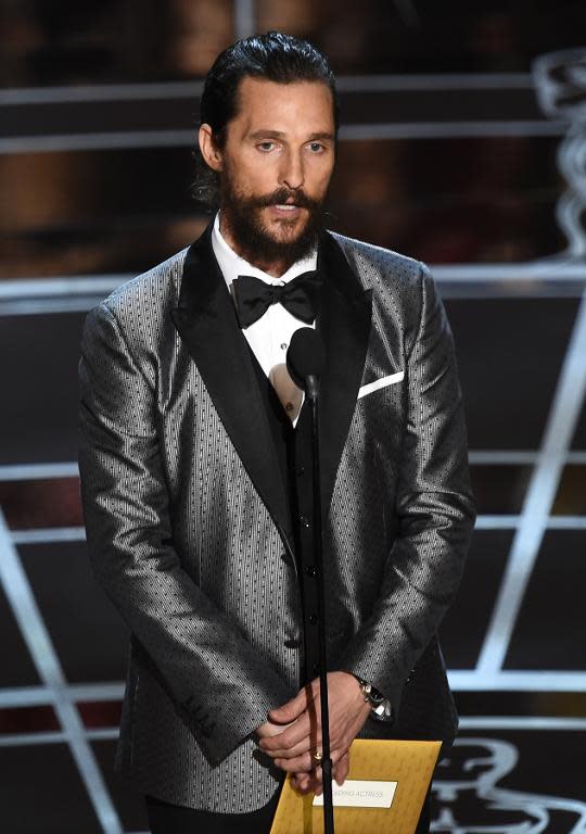 Matthew McConaughey presents an award on stage at the 87th Oscars on February 22, 2015