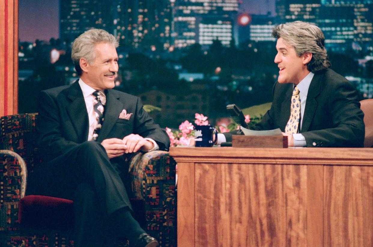 Alex Trebek and Jay Leno sit down for a chat on "The Tonight Show" on Nov. 14, 1994.