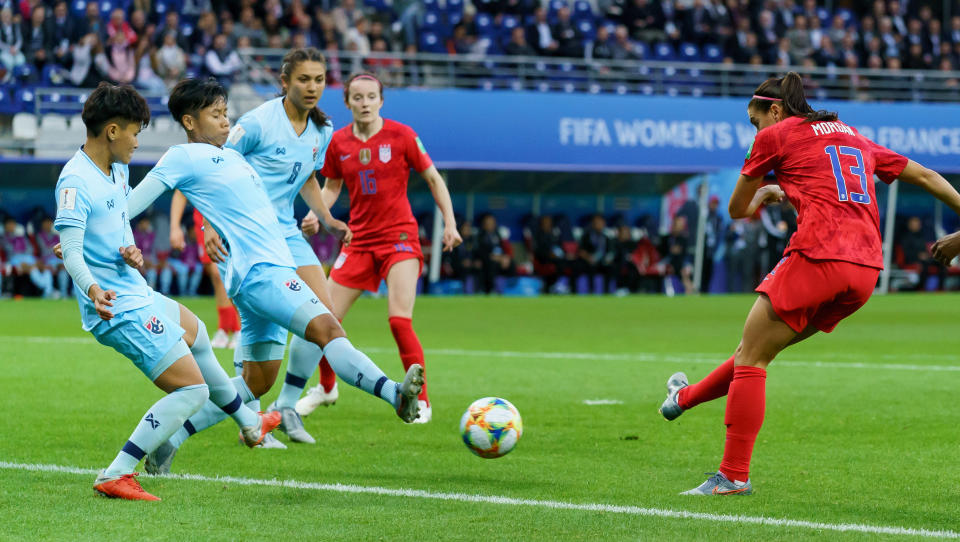 REIMS, FRANCE - JUNE 11: Silawan Intamee of Thailand, Kanjanaporn Saengkoon of Thailand and Alex Morgan of USA battle for the ball during the 2019 FIFA Women's World Cup France group F match between USA and Thailand at Stade Auguste Delaune on June 11, 2019 in Reims, France. (Photo by TF-Images/Getty Images)