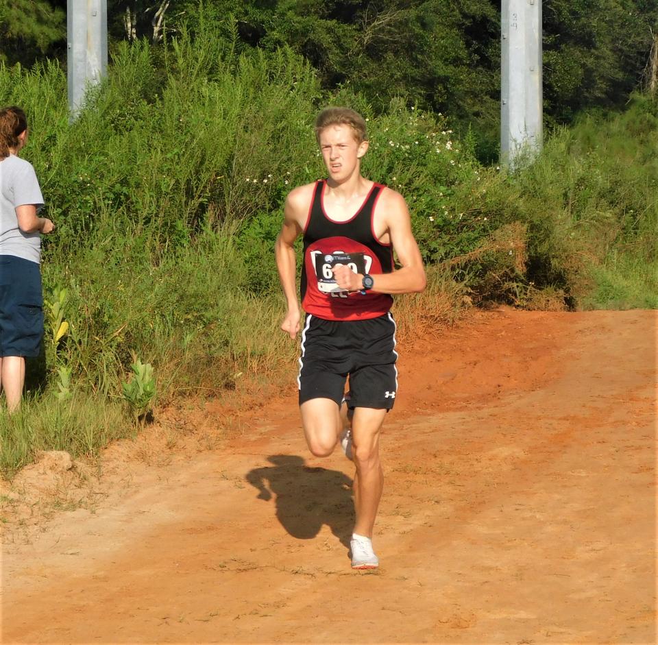 Pensacola Christian Academy senior Jonathan Tutton heads for a runner-up finish at the 20th annual Gulf Coast Stampede held Saturday, Sept. 11, 2021 from the Escambia County Equestrian Center.