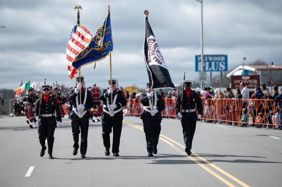 Worcester Fire Pipes & Drums march during the Worcester County St. Patrick's Parade Sunday.