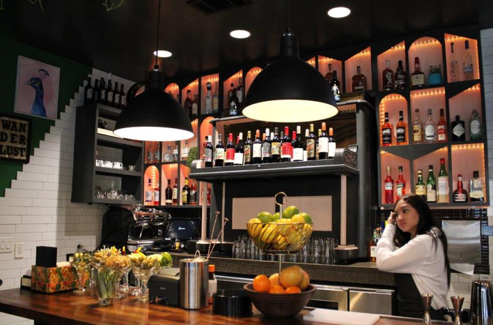 Cafe Americana’s bar features top shelf liquors, garnishes and wines from Spain, France, and California.