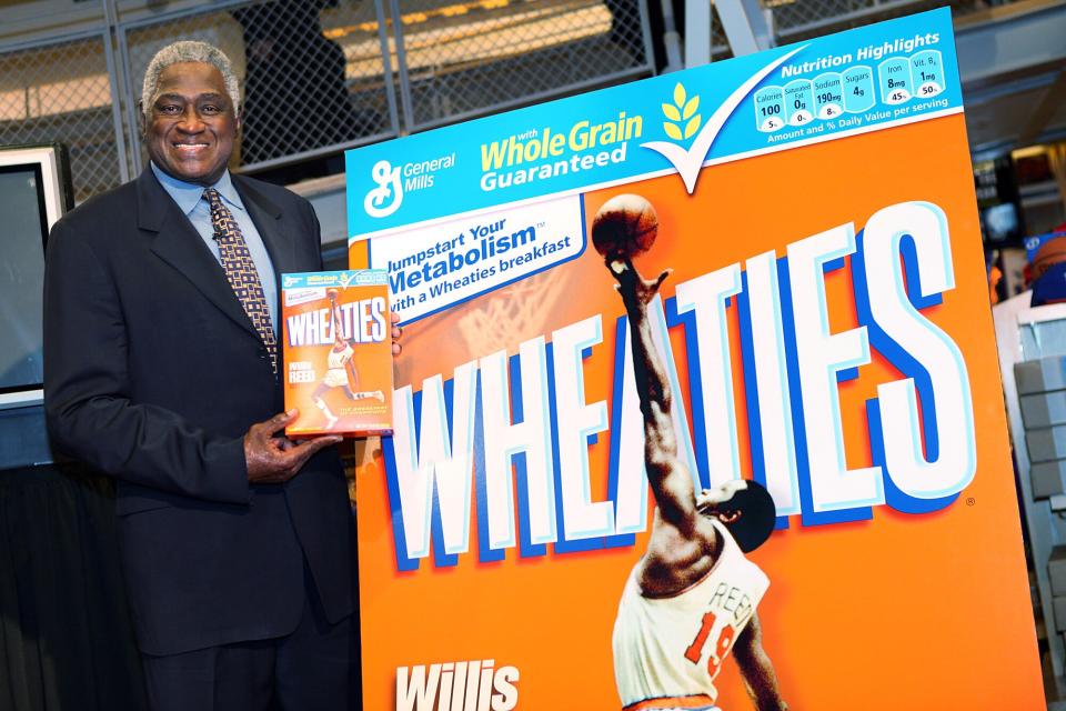 NBA legend Willis Reed poses with his Wheaties box during the unveiling of the special-edition Wheaties box at the NBA Store on February 4, 2009 in New York City.