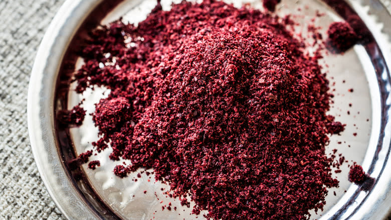 Ground sumac on silver plate