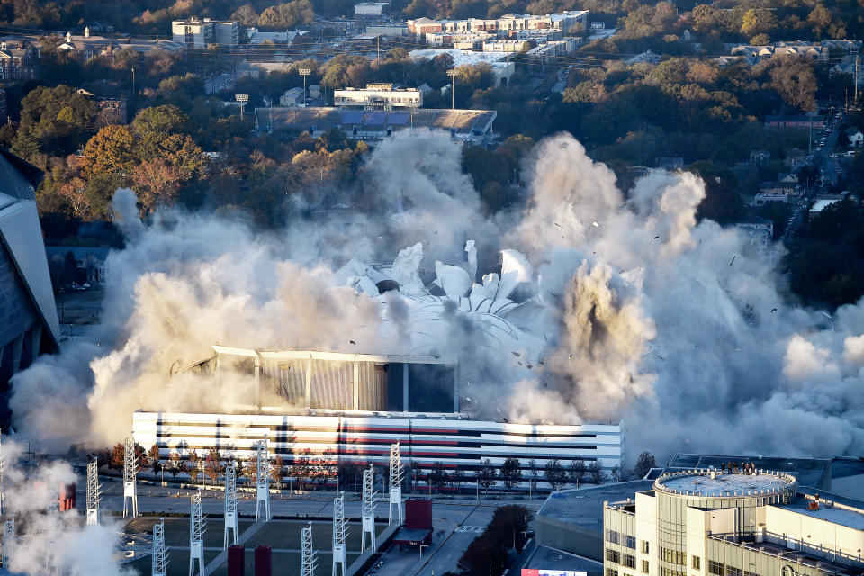 <p>The Georgia Dome is destroyed in a scheduled implosion Monday, Nov. 20, 2017, in Atlanta. The dome was not only the former home of the Atlanta Falcons but also the site of two Super Bowls, 1996 Olympics Games events and NCAA basketball tournaments among other major events. (AP Photo/Mike Stewart) </p>