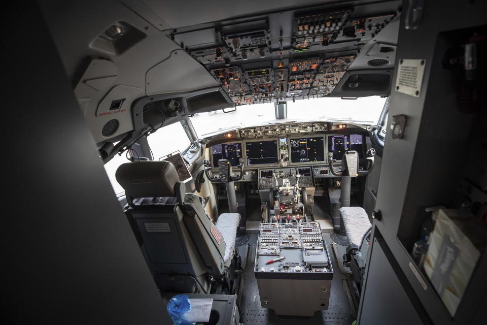 The flight deck of a WestJet Airlines Boeing 737 Max aircraft is seen after arriving at Vancouver International Airport in Richmond, B.C., on Thursday, Jan.  21, 2021. The flight from Calgary was the first commercial Boeing 737 Max flight in Canada since the aircraft was grounded worldwide in 2019 following two deadly crashes.  (Darryl Dyck/The Canadian Press via AP)