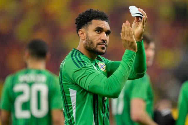 Northern Ireland’s Jamie Reid applauds the fans