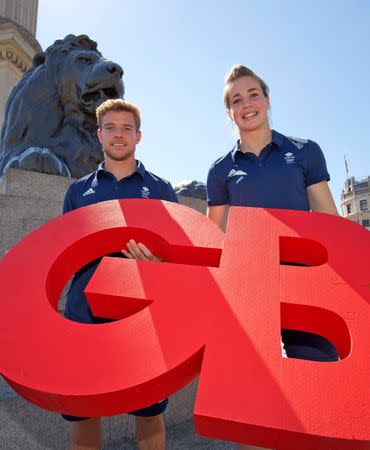 Britain Rugby Union - Team GB - Rio 2016 Rugby Sevens Team Announcement - Brazilian Embassy, London - 19/7/16 Team GB Rugby Sevens men's and women's captain's Tom Mitchell and Emily Scarratt pose for a photo in Trafalgar Square Action Images via Reuters / Henry Browne Livepic EDITORIAL USE ONLY.