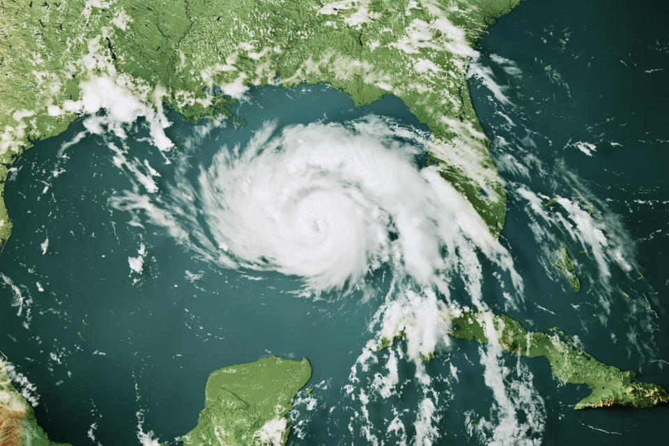 Clouds of Hurricane Ida (Aug 28, 2021) on a topographic map of the Gulf of Mexico.  / Credit: Frank Ramspott / Getty Images