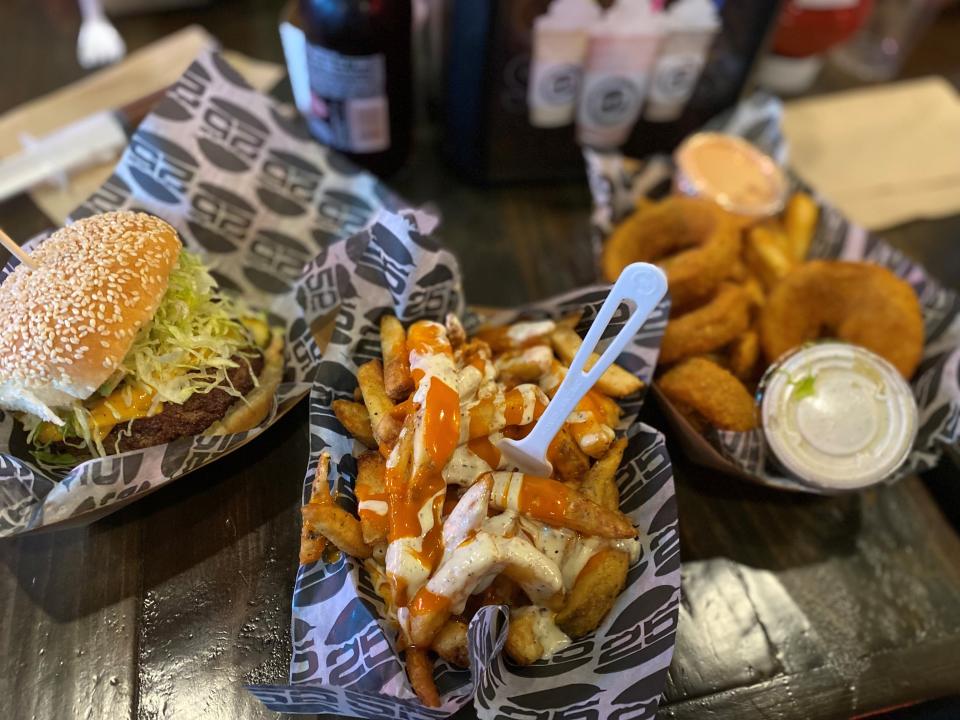 Buffalo fries, "The Smack" burger and onion rings at Burger 25 in Toms River.