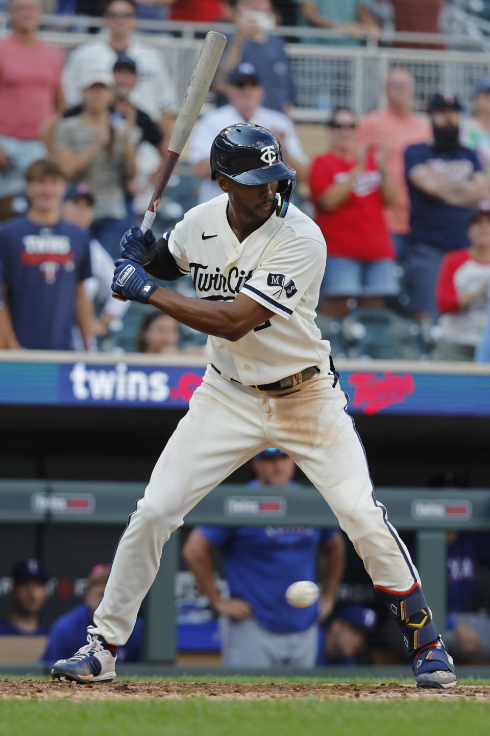 Minnesota Twins' Michael A. Taylor lets ball four go by to earn a game winning walk against the Texas Rangers in the 13th inning of a baseball game Sunday, Aug. 27, 2023, in Minneapolis. The Twins won 7-6 in 13 innings. (AP Photo/Bruce Kluckhohn)