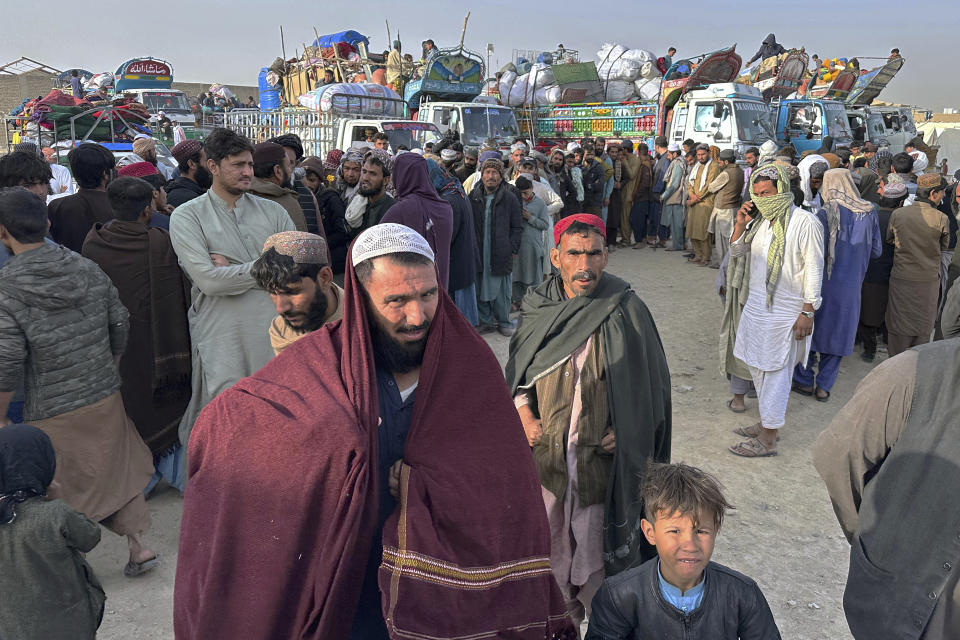 Afghans wait for clearance to depart for their homeland at a deportation camp set up by authorities to facilitate illegal immigrants, in Chaman, a town on the Pakistan-Afghanistan border, Wednesday, Nov. 1, 2023. Pakistani security forces on Wednesday rounded up, detained and deported dozens of Afghans who were living in the country illegally, after a government-set deadline for them to leave expired, authorities said. (AP Photo/Habibullah Achakzai)