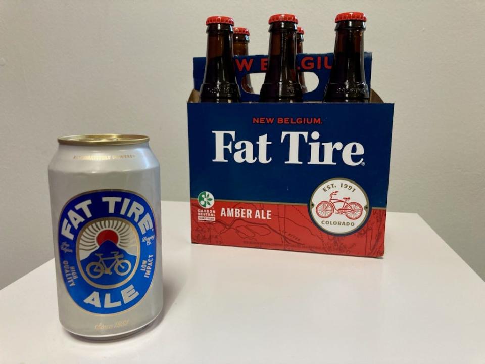 New Belgium Brewing Co. is introducing a new recipe and branding of its flagship Fat Tire beer. The original beer (right) is an amber ale and the new beer (left) is a classic ale that's lighter, brighter and crisper.