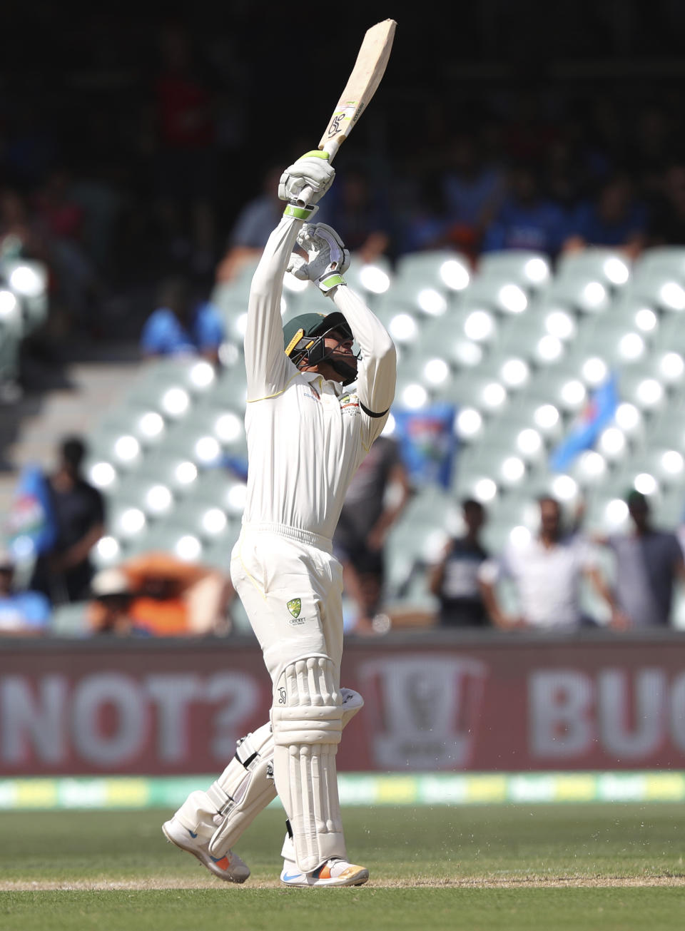 Australia's Usman Khawaja plays at the ball during the first cricket test between Australia and India in Adelaide, Australia,Sunday, Dec. 9, 2018. (AP Photo/James Elsby)