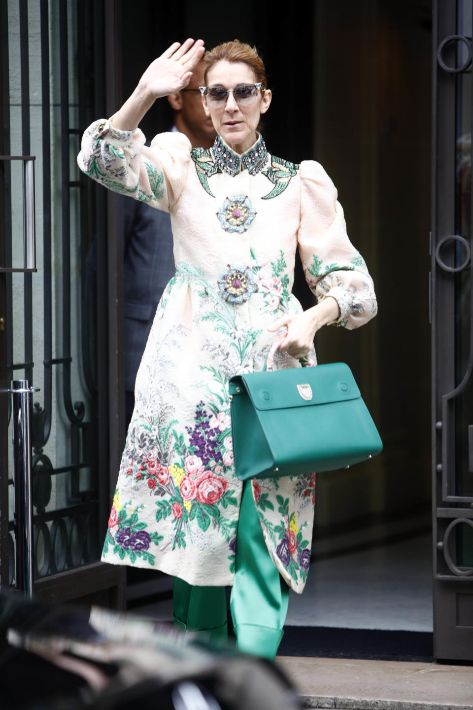 Dion and Gucci made a perfect, chic match with this floral look the singer wore while leaving her Paris hotel on July 2, 2017. (Photo by Mehdi Taamallah/NurPhoto via Getty Images)