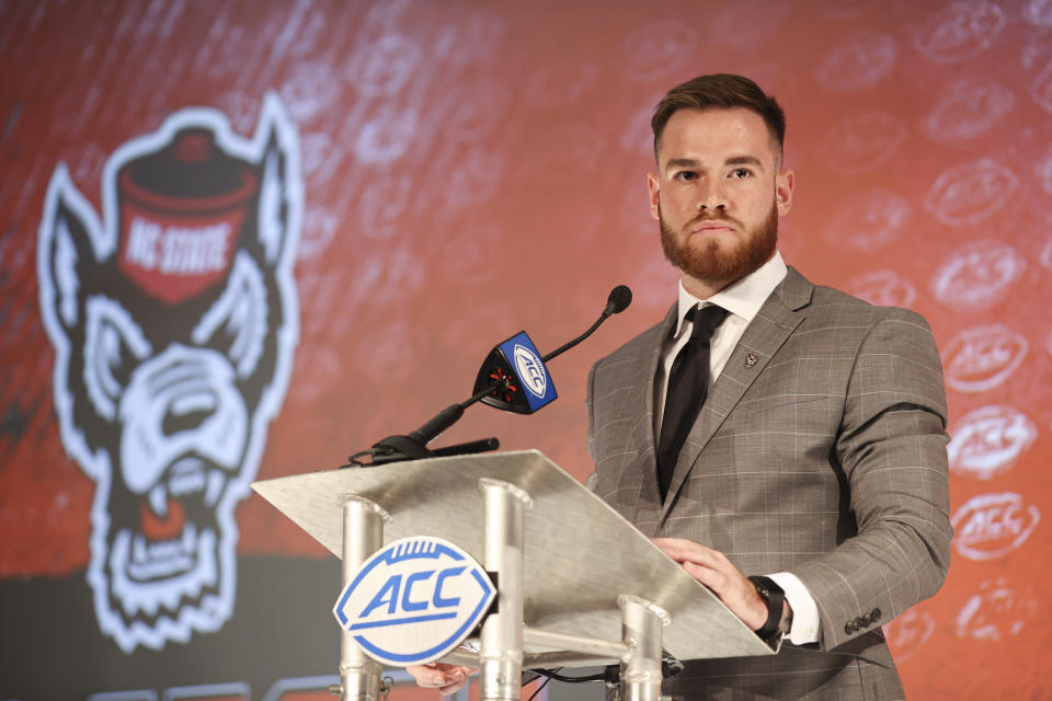North Carolina State quarterback Devin Leary answers a question during an NCAA college football news conference at the Atlantic Coast Conference media days in Charlotte, N.C., Thursday, July 22, 2021. (AP Photo/Nell Redmond)