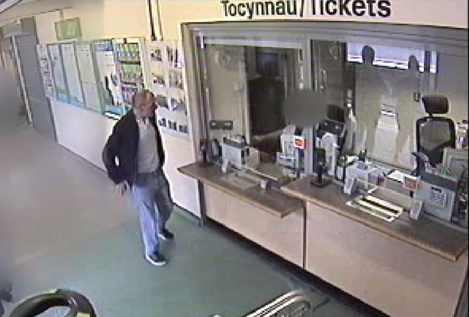 David Gaut as he buys train tickets around 11.39am at Caerphilly Train Station in south Wales, hours before he was killed by his neighbour. (PA)