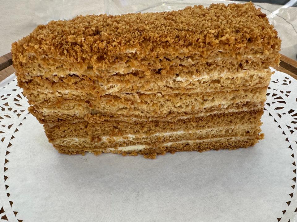 Honey cake, known in Ukrainian as medovyk, is one of that country's traditional cakes. One of Ames-based, Ukrainian-owned Piece & Freedom bakery's menu items, it features several layers of moist honey sponge cake and Chantilly cream.