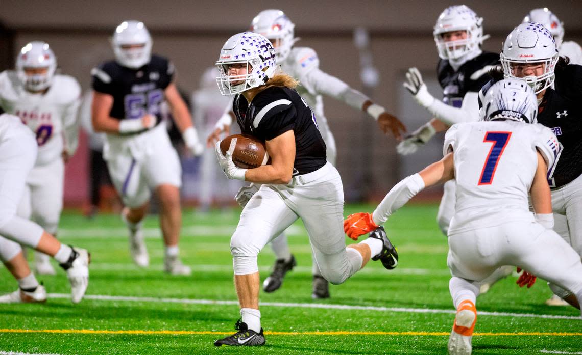 Sumner running back Mathew Spurbeck breaks loose against the Graham-Kapowsin defense during Friday night’s 4A football state quarterfinal game at Sunset Chev Stadium in Sumner, Washington, Nov. 18, 2022. Graham-Kapowsin won the game, 28-21.