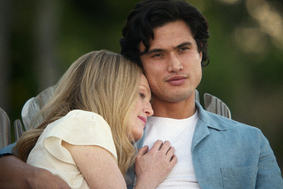 Julianne Moore puts her head on  Charles Melton's shoulder. (Netflix)