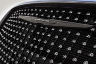 <p>…and see that the grille is actually made of hundreds of tiny “M” Mopar logos. It’s the perfect accessory for 300 owners whose names begins with M, and a questionable choice otherwise.</p>