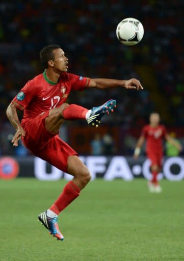 Portuguese midfielder Nani controls the ball during the Euro 2012 football championships match Portugal vs. Netherlands at the Metalist stadium in Kharkiv. Portugal beat the Netherlands 2-1 on Sunday to set up a Euro 2012 quarter-final with the Czech Republic and condemn the Dutch to a first group-stage European Championship exit since 1980