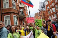 LONDON, ENGLAND - AUGUST 16: Protesters gather outside the Ecuadorian Embassy, where Julian Assange, founder of Wikileaks is staying on August 16, 2012 in London, England. Mr Assange has been living inside Ecuador's London embassy since June 19, 2012 after requesting political asylum whilst facing extradition to Sweden to face allegations of sexual assault. (Photo by Dan Kitwood/Getty Images)