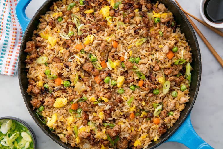 <p>Kiss greasy takeaway fried rice goodbye.</p><p>Get the <a href="https://www.delish.com/uk/cooking/recipes/a29185448/how-to-make-pork-fried-rice/" rel="nofollow noopener" target="_blank" data-ylk="slk:Pork Fried Rice;elm:context_link;itc:0;sec:content-canvas" class="link ">Pork Fried Rice</a> recipe.</p>