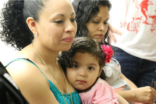 Liliana Cruz Mendez, an undocumented woman from El Salvador, with her daughter. (Photo: Courtesy of CASA)