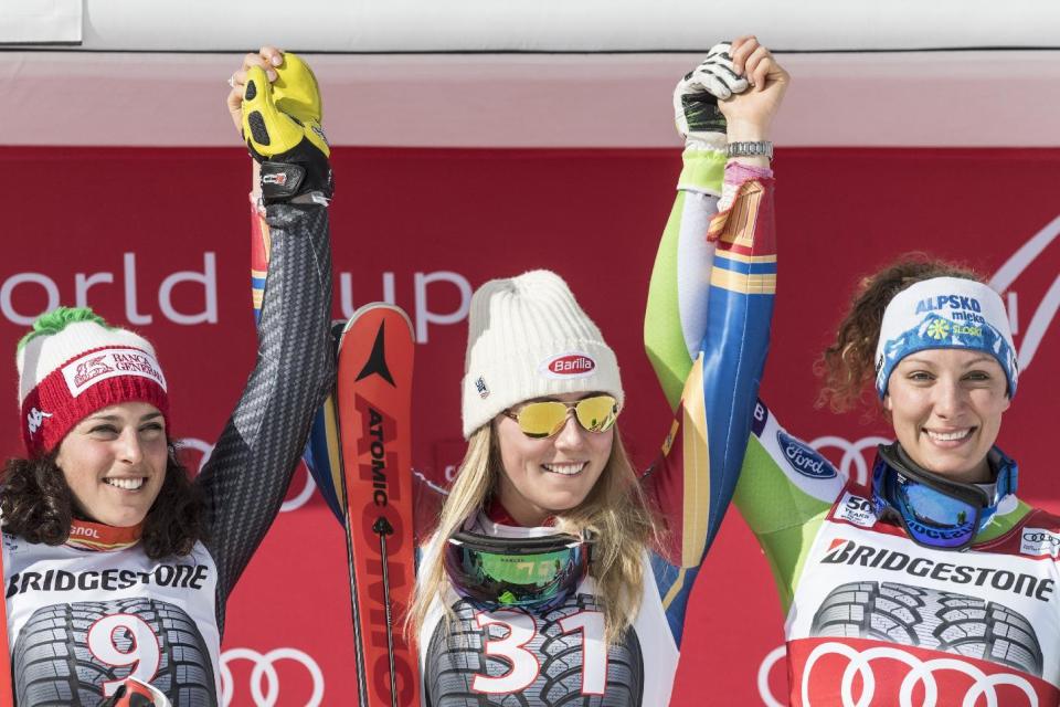 Second placed Federica Brignone of Italy, winner Mikaela Shiffrin of the US and third placed Ilka Stuhec of Slovenia, from left, celebrate on the after the women's alpine combined competition at the Alpine Skiing World Cup in Crans-Montana, Switzerland, Sunday, Feb. 26, 2017. (Alessandro della Valle/Keystone via AP)