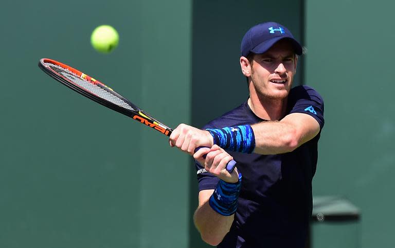 Andy Murray of Great Britain hits a backhand return at the BNP Paribas Tennis Open in Indian Wells, California on March 19, 2015