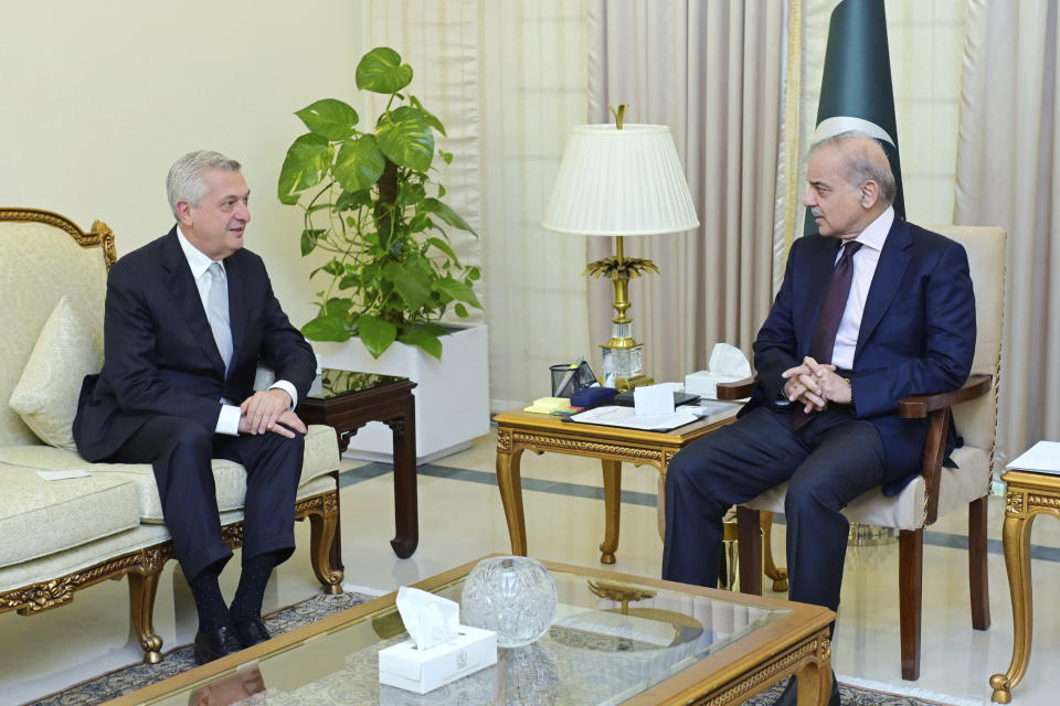 In this photo released by Pakistan's Prime Minister Office, the U.N. High Commissioner for Refugees, Filippo Grandi, left, meets with Pakistan's Prime Minister Shehbaz Sharif, in Islamabad, Pakistan, Tuesday, July 9, 2024. The head of the U.N. refugee agency met with Sharif in the capital, Islamabad to discuss problems faced by the Afghan refugees, who have been living in the country in a state of uncertainty since last year when Islamabad started expelling foreigners, officials said. (Prime Minister Office via AP)
