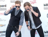 LAS VEGAS, NV - MAY 19: Singers Brian Kelley (L) and Tyler Bubbard of Florida Georgia Line arrive at the 2013 Billboard Music Awards at the MGM Grand Garden Arena on May 19, 2013 in Las Vegas, Nevada. (Photo by Jason Merritt/Getty Images)